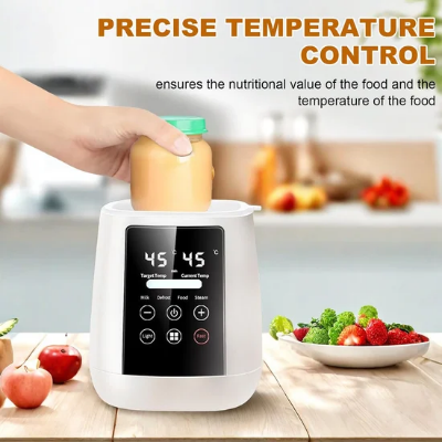 White bottle warmer with digital temperature display showing 45 degrees Celsius being used to heat a baby bottle.